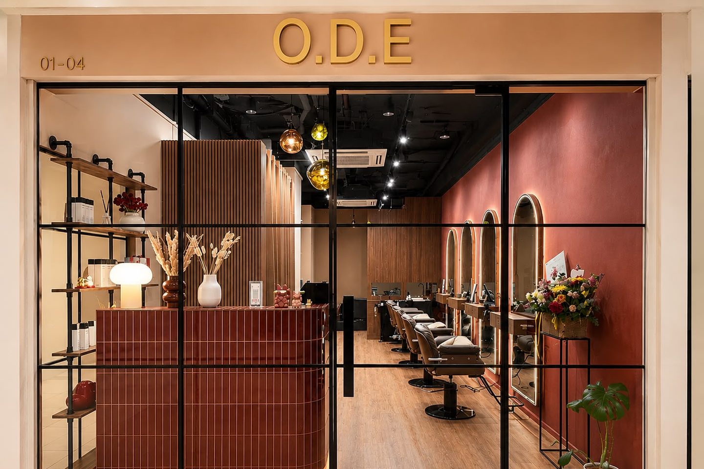 The O.D.E shopfront at Unit #01-04, Havelock 2, looking into the maroon-tiled reception and arched-mirror styling row, near Clarke Quay