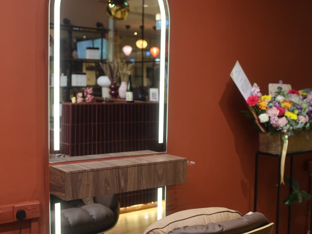 Wall-mounted product display with rolled towels at One Degree Edit, Havelock 2